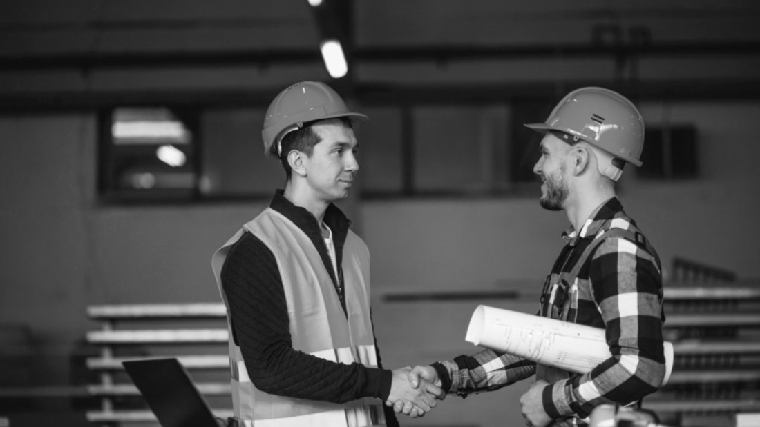 Two colleagues at a factory